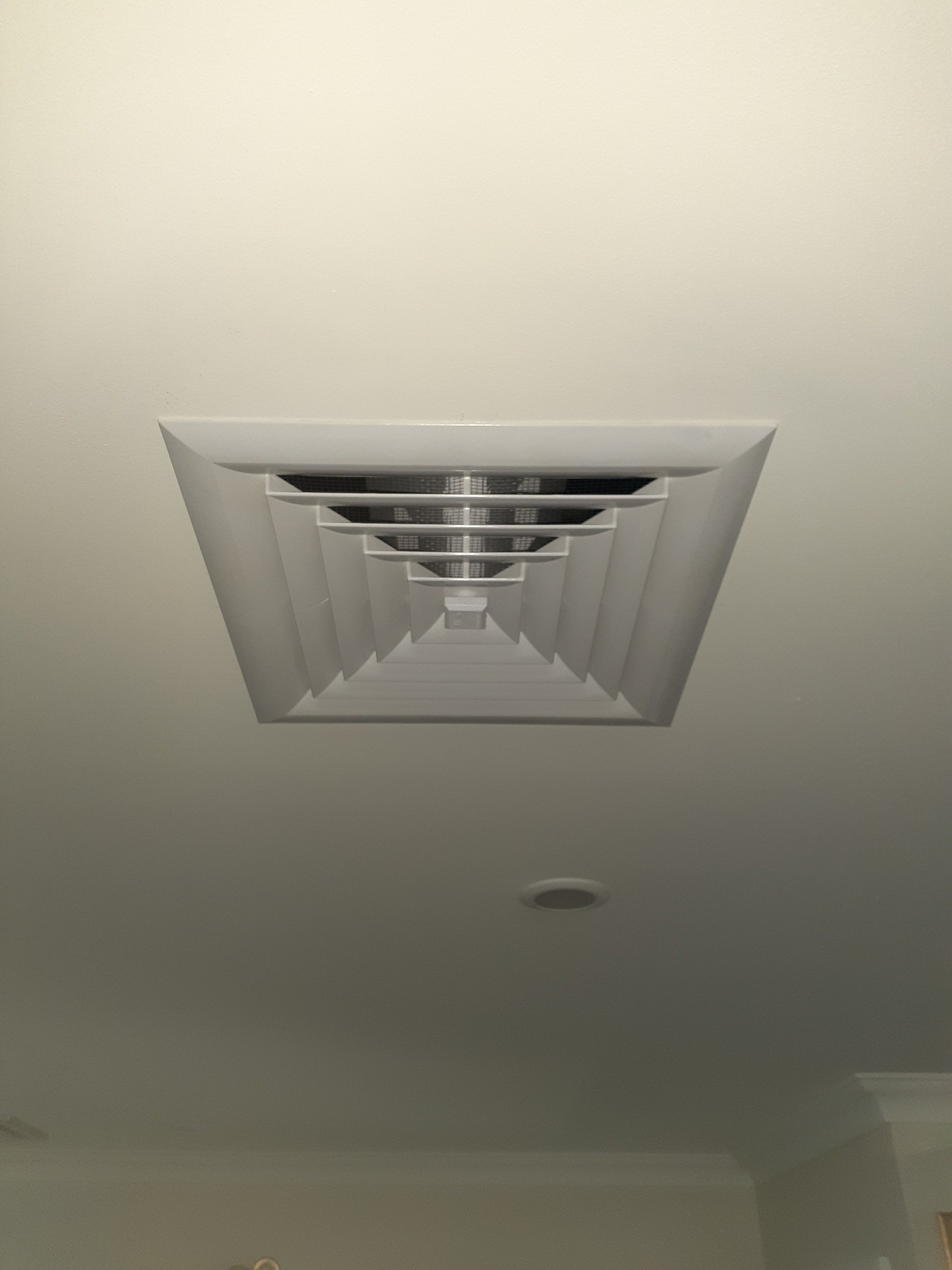 A ceiling grill was installed on an upper-floor ceiling. 